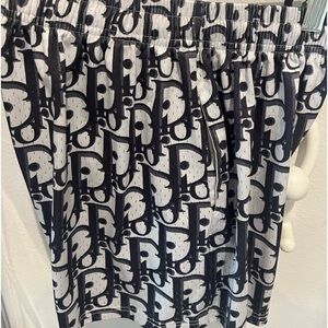 Black Dior shorts